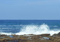 Strand und Wellen